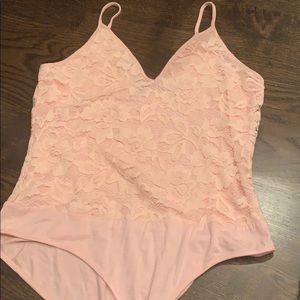Pink body suit